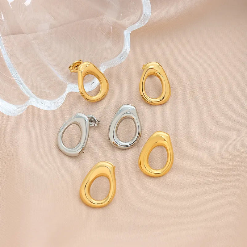 Aretes Hollow Oro y Plata