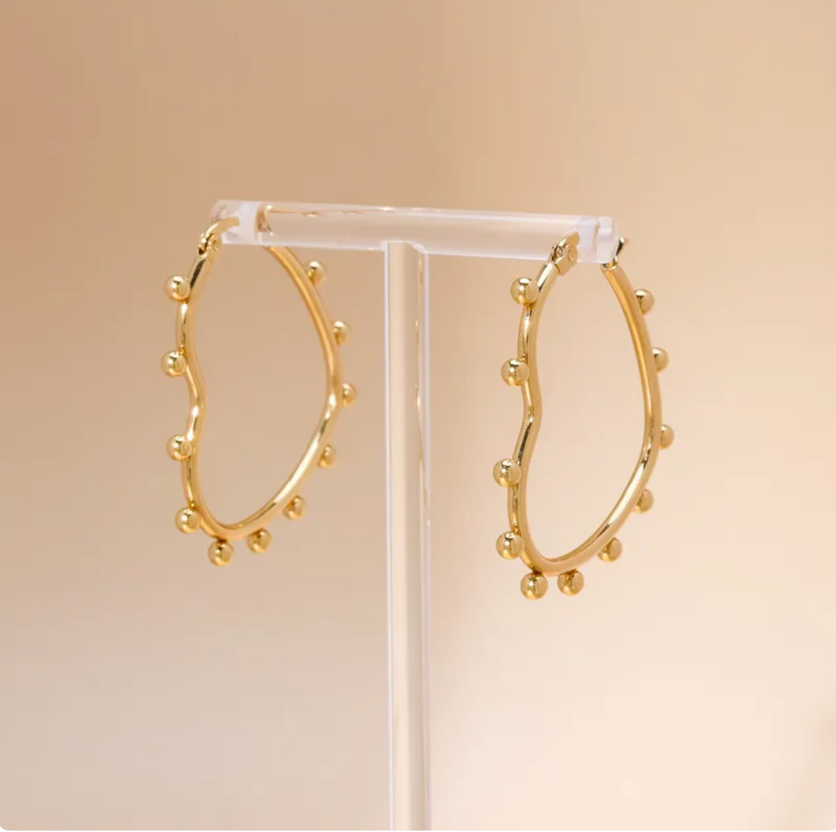 Arracadas Medianas Corazon con puntos