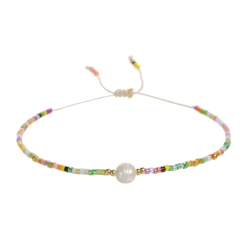 Pulseras  de colores con Perla