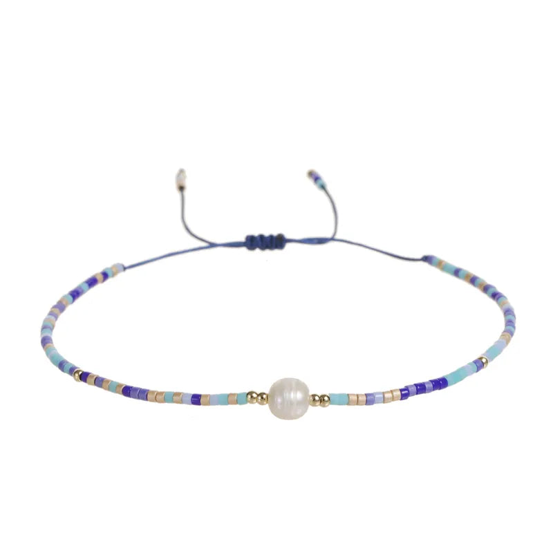 Pulseras  de colores con Perla