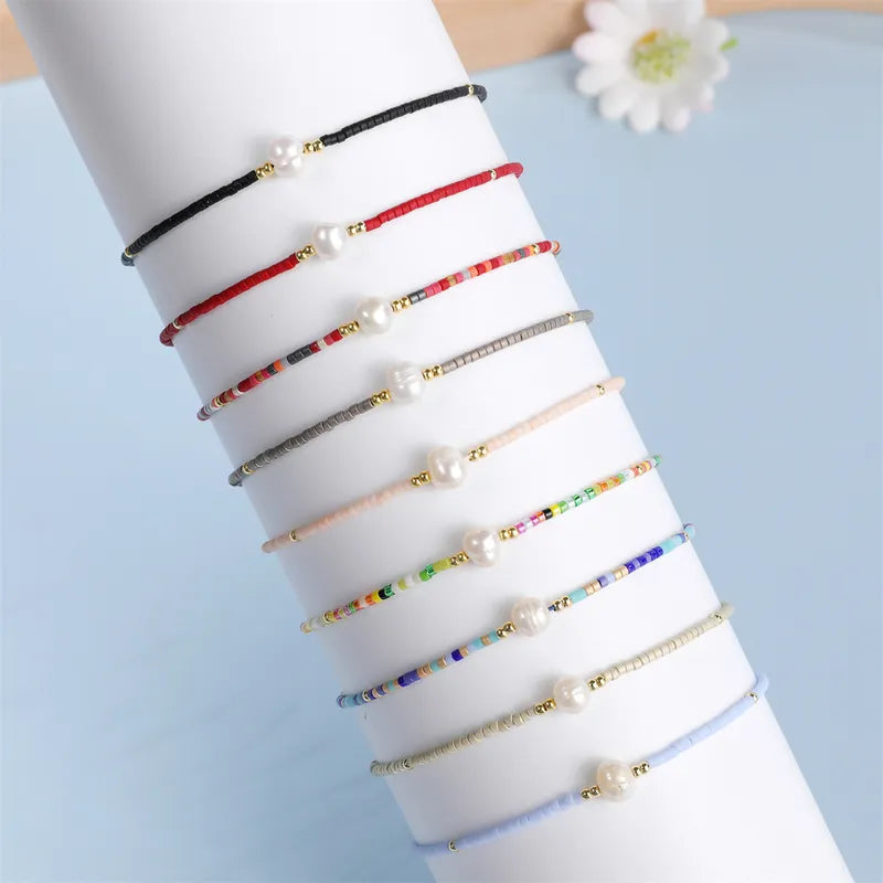 Pulseras  de colores con Perla