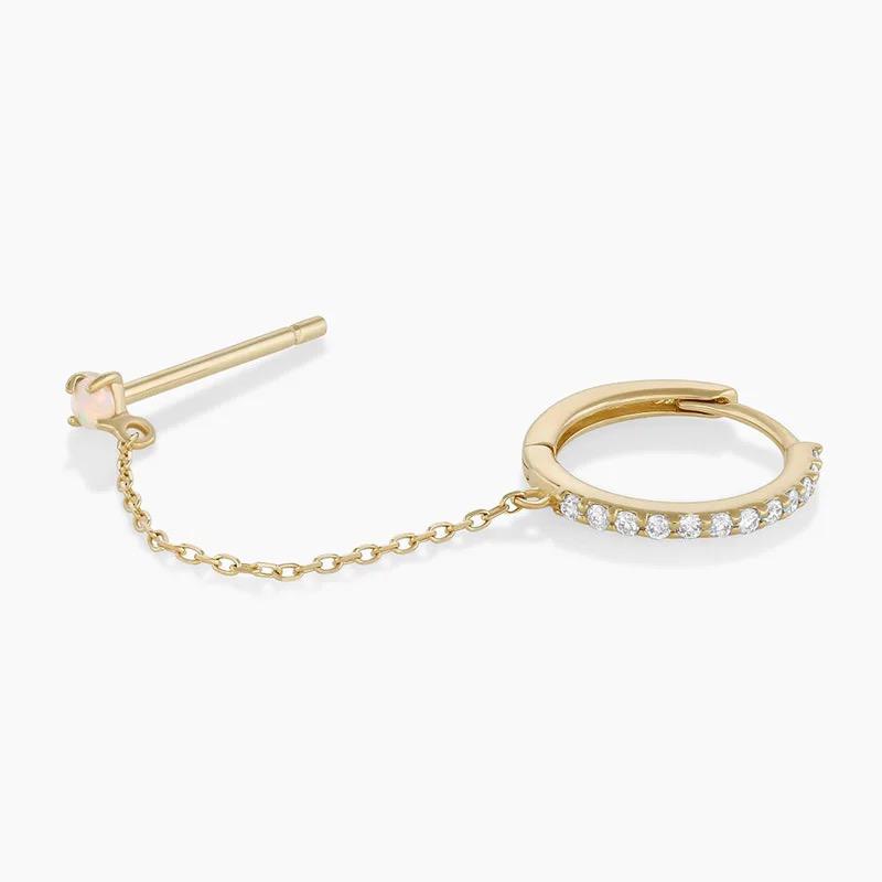Stud de madre perla con huggie dorado